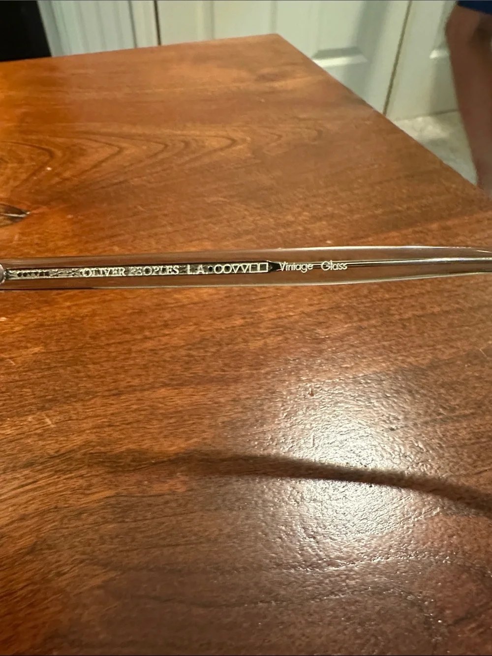 Oliver Peoples Clear Frame Sunglasses with Brown Lenses